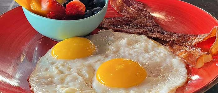 Daisys Garage is serving up breakfast with eggs, bacon and fruit in Cedar Rapids Iowa.