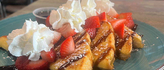 Strawberry French toast for Breakfast from Daisys Garage in Cedar Falls and Marion, Iowa.